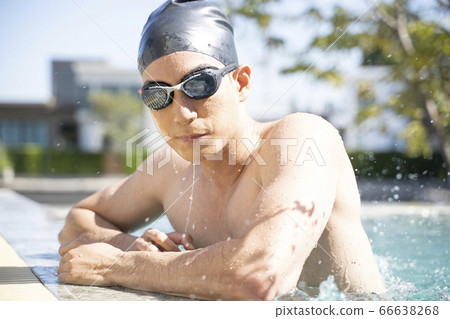 Young men swimming Young men swimming 66638268