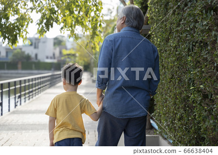 Senior men and boys taking a walk 66638404