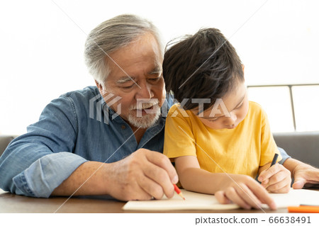 Senior men and boys relaxing indoors 66638491