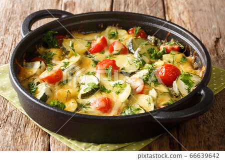 Vegetarian casserole with zucchini cheese and 66639642