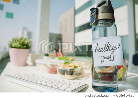 Bottle of water and healthy meal lunch box set in 66640453