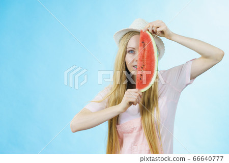 woman holding watermelon fruit woman holding watermelon fruit 66640777