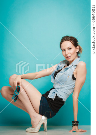 Summer fashion girl in jeans shirt shorts and high Summer fashion girl in jeans shirt shorts and high 66640812