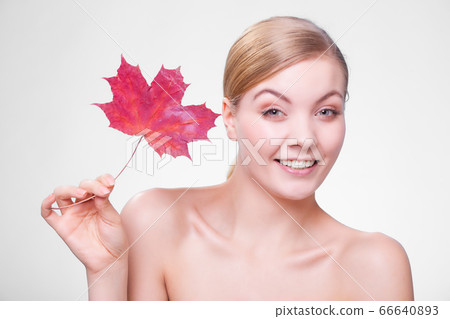 Skin care. Portrait of young woman girl with red 66640893