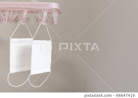 A cloth mask that has been dried indoors after washing A cloth mask that has been dried indoors after washing 66647419