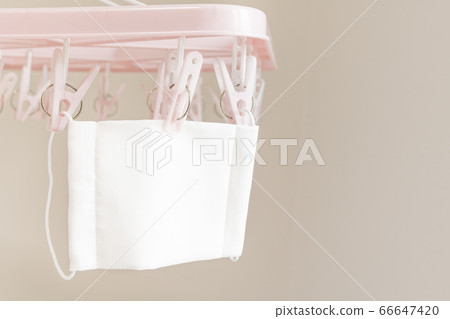 A cloth mask that has been dried indoors after washing A cloth mask that has been dried indoors after washing 66647420