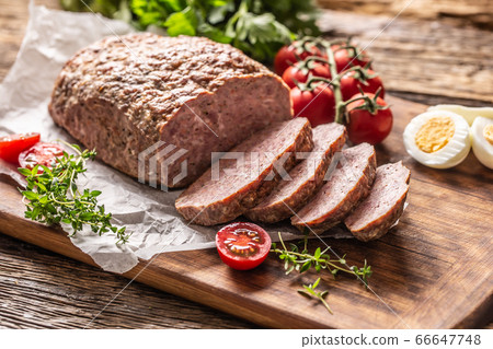 Homemade ground meatloaf with eggs tomatoes celery Homemade ground meatloaf with eggs tomatoes celery 66647748