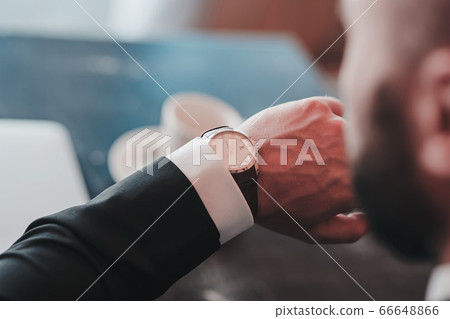 classic watch on businessman hand 66648866