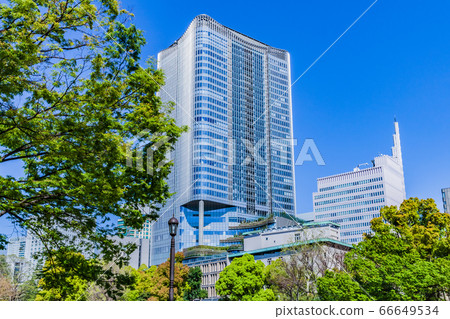 Cityscape with fresh green grove and Hibiya building Cityscape with fresh green grove and Hibiya building 66649534