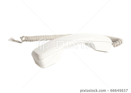 Telephone receiver and cord isolated on white Telephone receiver and cord isolated on white 66649837