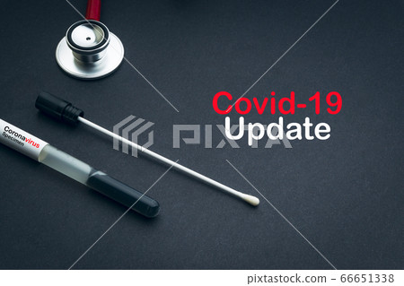 COVID-19 UPDATE text with stethoscope and medical COVID-19 UPDATE text with stethoscope and medical 66651338