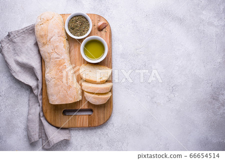 Homemade French baguettes with olive oil Homemade French baguettes with olive oil 66654514