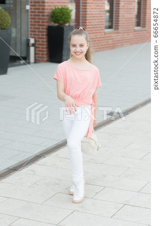 Casual clothing, everyday living. Happy small girl 66654872