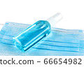 Blue medical face mask and antiseptic spray 66654982
