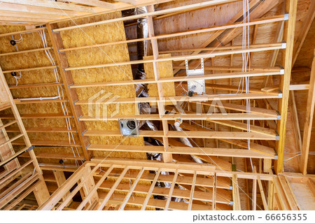Residential house with wooden frame under 66656355