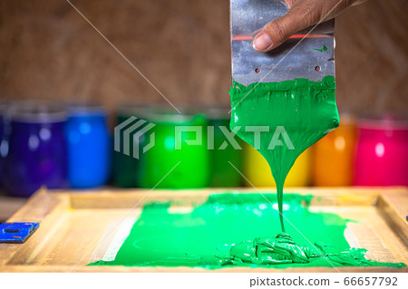 green color dripping from hand screen printing 66657792