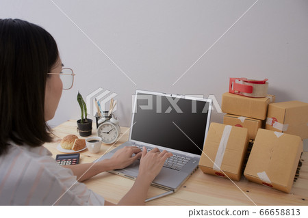 woman holding a package, business SME, startup 66658813