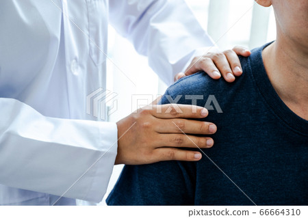 Physical therapy hands doing shoulder therapy for patients in the hospital 66664310