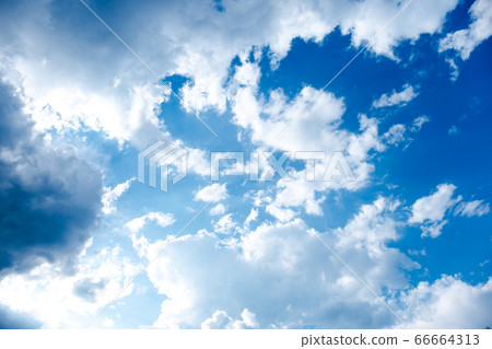 White and black clouds in the beautiful blue sky White and black clouds in the beautiful blue sky 66664313