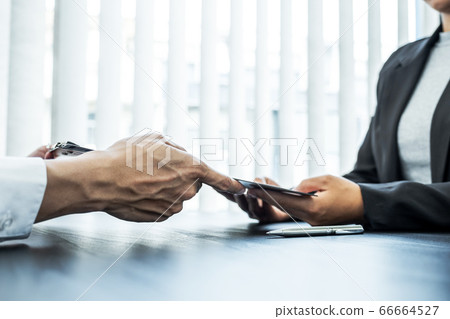 Office executives are interviewing job applicants in the meeting room Office executives are interviewing job applicants in the meeting room 66664527
