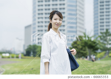 A woman walking 66665353