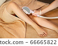 Image of foot treatment at hair removal salon (without face) 66665822