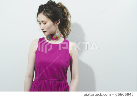 A woman in a dress A woman in a dress 66666945