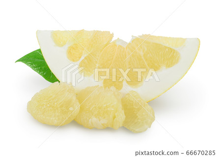 pomelo slice with leaf isolated on white background with clipping path and full depth of field 66670285