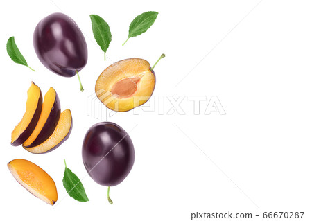 fresh purple plum and half with leaves isolated on white background with clipping path and full depth of field. Top view. Flat lay fresh purple plum and half with leaves isolated on white background with clipping path and full depth of field. Top view. Flat lay 66670287