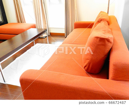 Living room (mainly sofa) with an orange sofa on the side of the window where bright sunlight shines 1478 Living room (mainly sofa) with an orange sofa on the side of the window where bright sunlight shines 1478 66672487