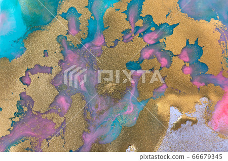 Gold mixed with pink and green inks background. Gold mixed with pink and green inks background. 66679345