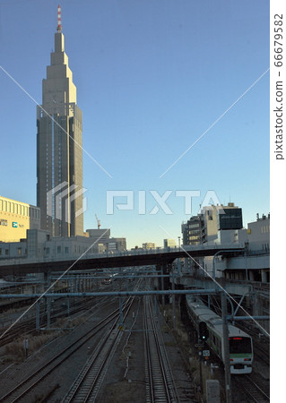 Symbol tower and Yamanote line against the sky of New Year 66679582
