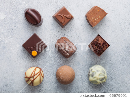 Luxury Chocolate candies selection on light table Luxury Chocolate candies selection on light table 66679991