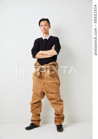 Waist-wrapped fashion wearing a workwear White wall overall work workwear Waist-wrapped fashion wearing a workwear White wall overall work workwear 66681654