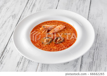 Portion of Tom Yum soup 66682265