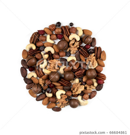 A pattern of nuts on a white background. A pattern of nuts on a white background. 66684861