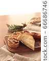 Fashionable bread on a wooden cutting board 66686746
