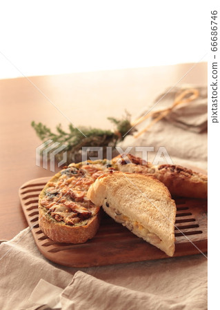 Fashionable bread on a wooden cutting board 66686746