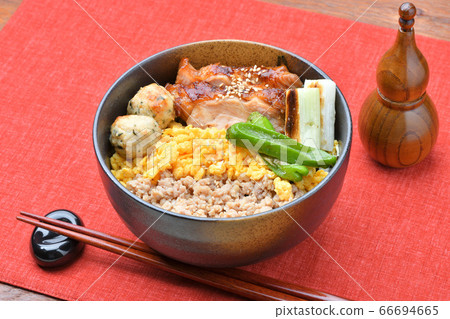 Yakitori bowl, Yakitori Shige, 3 color chicken bowl, Teriyaki Shige. Minced chicken meat, egg meat, chicken thigh teriyaki, tsukune, green onion. Yakitori bowl, Yakitori Shige, 3 color chicken bowl, Teriyaki Shige. Minced chicken meat, egg meat, chicken thigh teriyaki, tsukune, green onion. 66694665