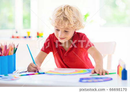 Kids paint. Child painting. Little boy drawing. 66698170