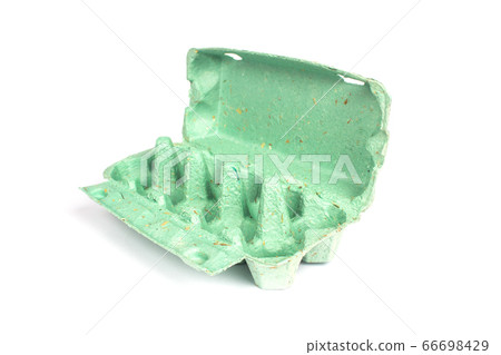Biodegradable egg box made recycled paper with composite additives as straw, leaves, petals, scobs isolated on white background with copyspace, mockup. Alternative packaging concept Biodegradable egg box made recycled paper with composite additives as straw, leaves, petals, scobs isolated on white background with copyspace, mockup. Alternative packaging concept 66698429