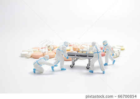 COVID-19 with miniature figure doll of people and COVID-19 with miniature figure doll of people and 66700854