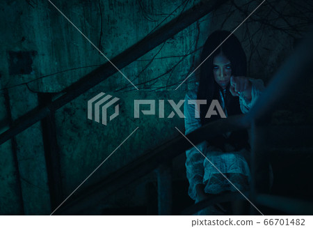 Ancient Thai ghost in traditional costume that Ancient Thai ghost in traditional costume that 66701482