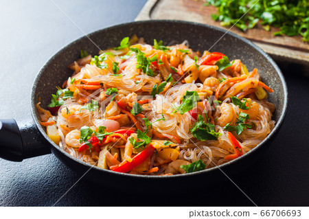 Asian food, glass noodles with vegetables and shrimps 66706693