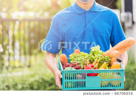 Delivery man wearing face mask protect he 66706858