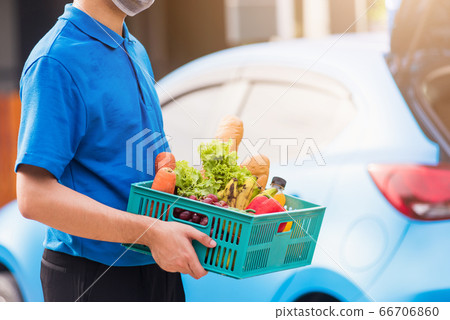 Delivery man wearing face mask protect he 66706860
