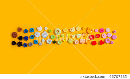 Variety of buttons of different shapes and colors Variety of buttons of different shapes and colors 66707285