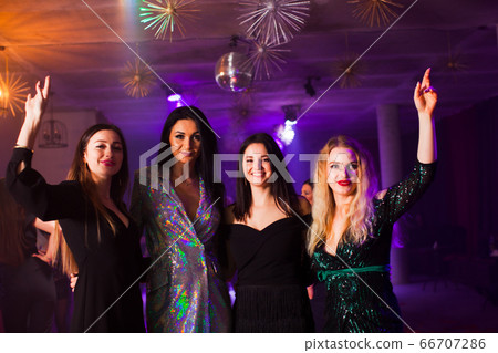 Female corporate is having fun at nightclub 66707286
