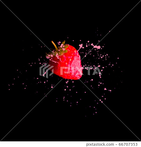 Strawberry in cream splash on black background 66707353