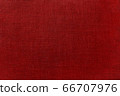 Red textured woven fabric background 66707976